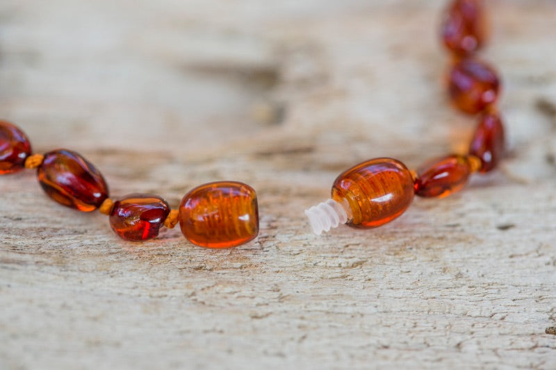 Armband tegen tandpijn door het barnsteen zuur