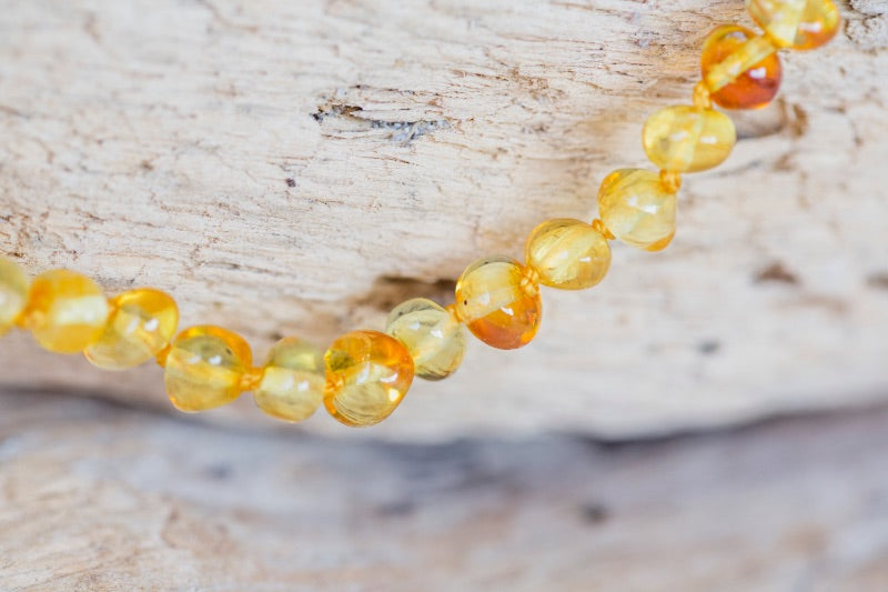 Armband tegen tandpijn door het zuur van de barnsteen