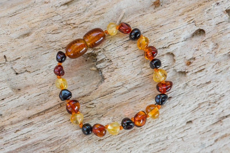 Tandjesarmband van barnsteen of amber met meerdere kleuren
