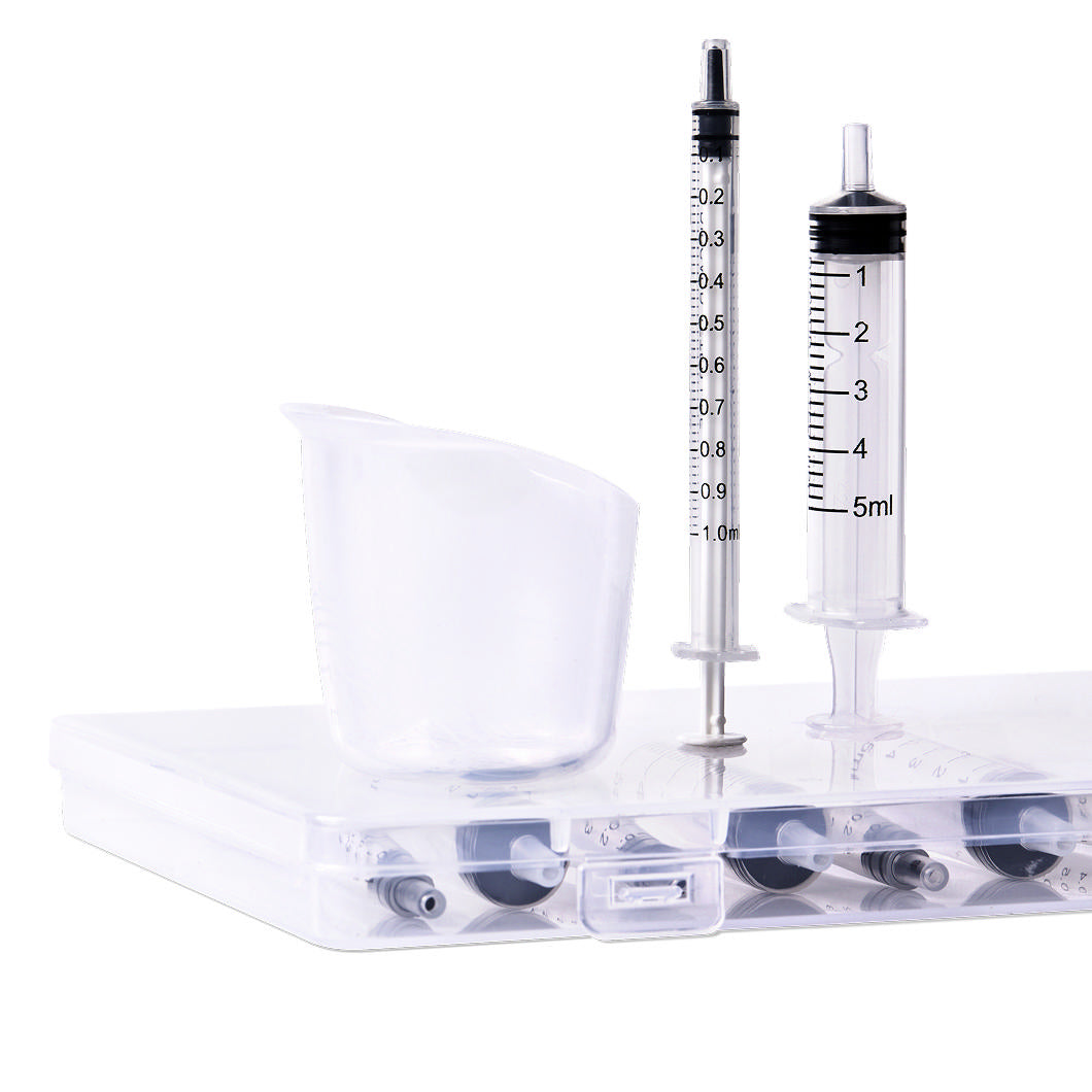 Elvie Colostrum Kit: opvangcup, bewaarspuitjes, labels en gids voor prenataal kolven