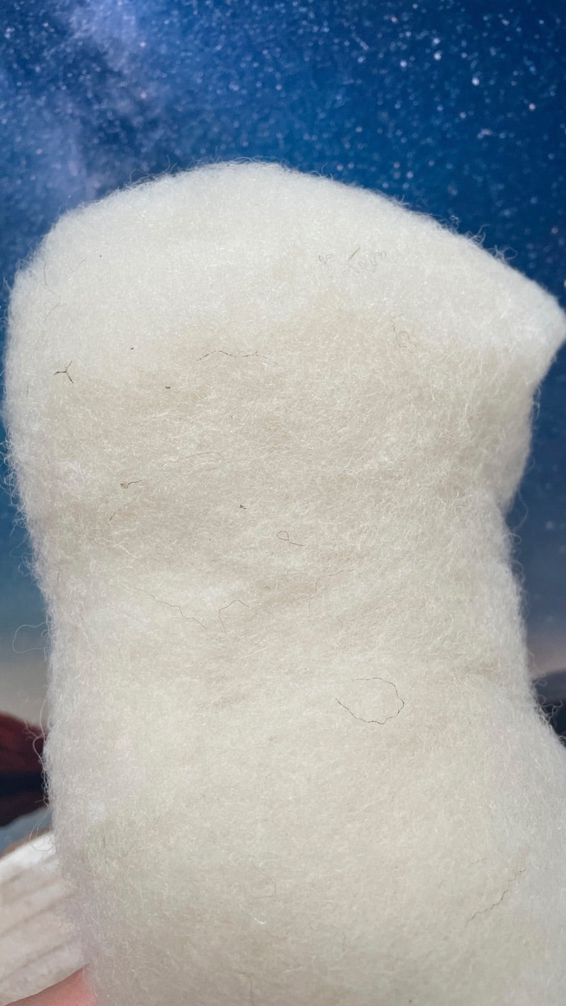 Biologische heilwol helpt vocht te absorberen en zorgt voor luchtcirculatie, bevorderend voor huidherstel