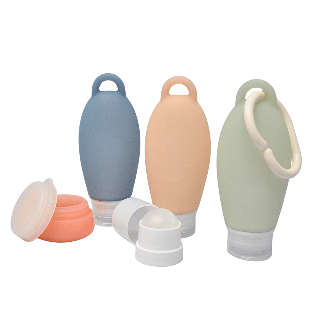 Owego Travel Kit: set met drie kleurgecodeerde reisflesjes, crèmepotje, rollertop en wolkvormige ring