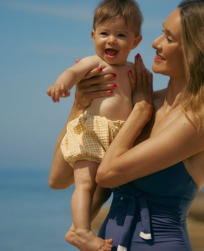 Cache Coeur Marty zwembroekje voor baby in geel ruitjesmotief