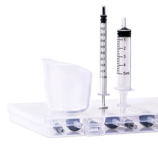 Elvie Colostrum Kit: opvangcup, bewaarspuitjes, labels en gids voor prenataal kolven